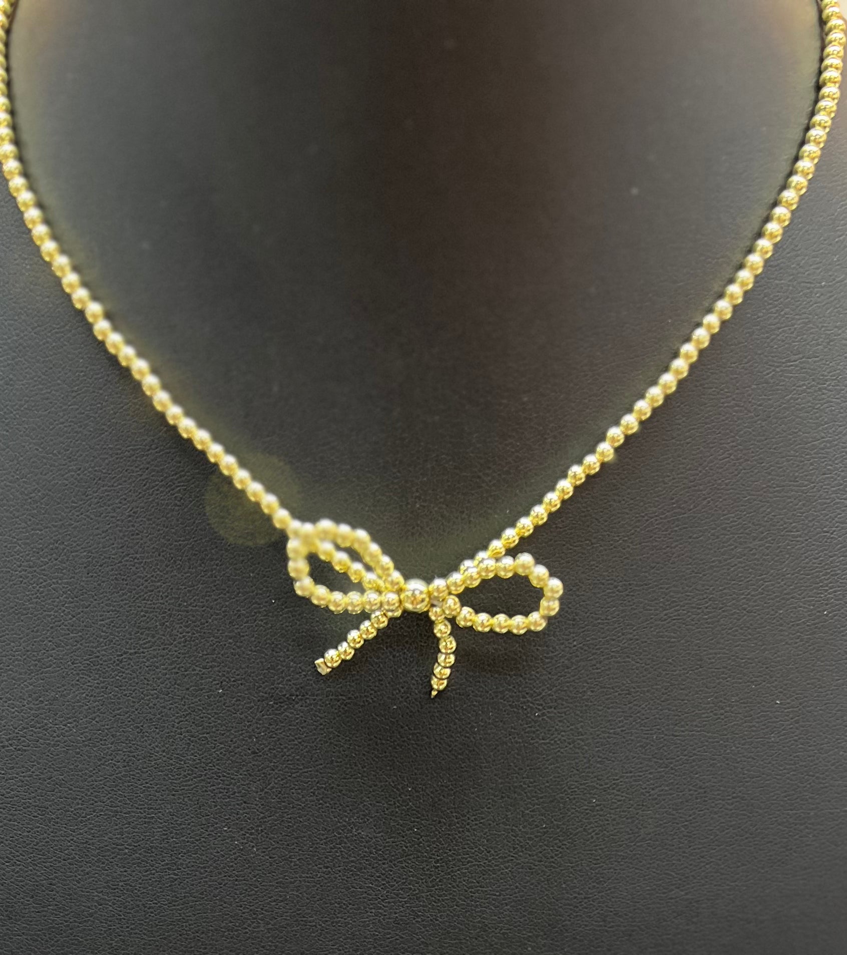 Gold Beaded Bow Necklace
