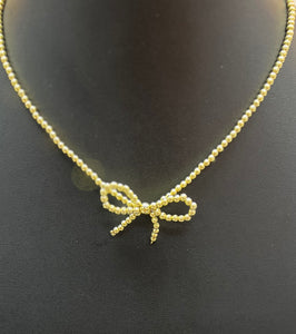 Gold Beaded Bow Necklace