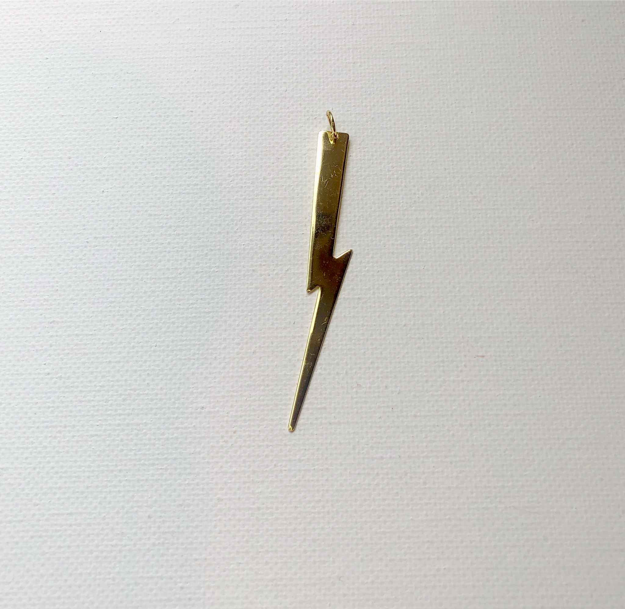 Gold Lightening Bolt Charm